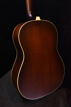 iris og sunburst acoustic guitar with distressed finish