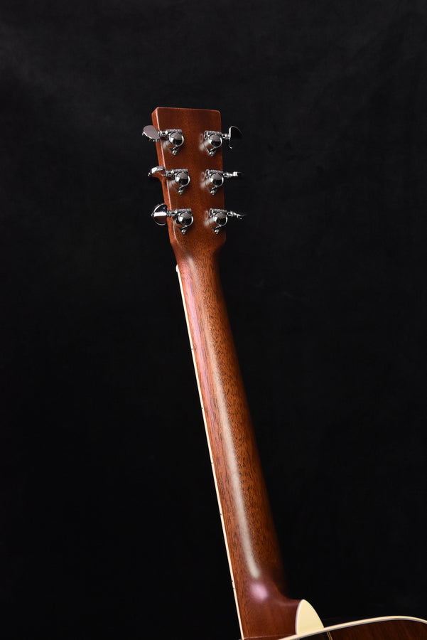 Left-handed acoustic guitar headstock and upper neck