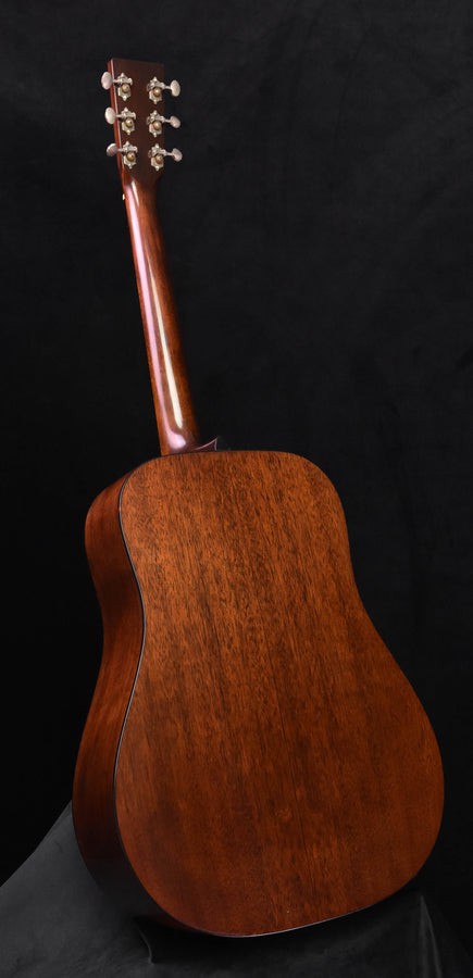 Amber burst acoustic guitar back and waist curve with headstock and tuners