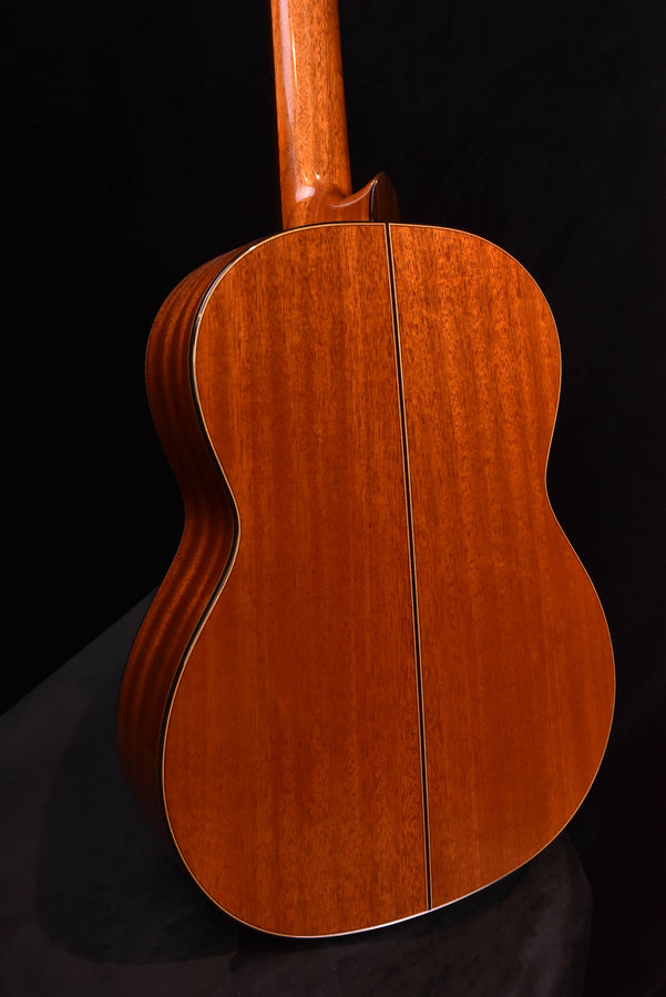 Classical guitar cedar top body with glossy wood grain