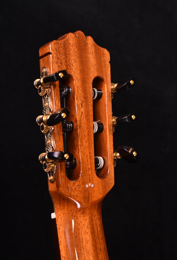 Classical guitar headstock with tuning machines and small inlays
