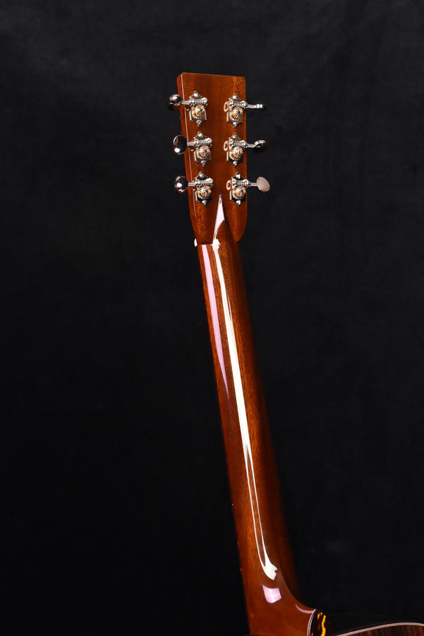 Acoustic guitar headstock side view with tuning machine details