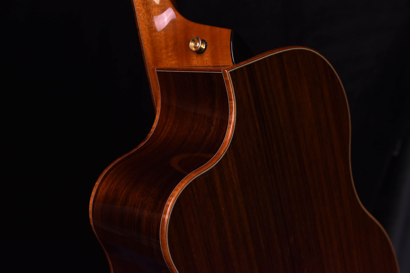 Acoustic guitar neck joint and upper bout, dark wood with cream trim
