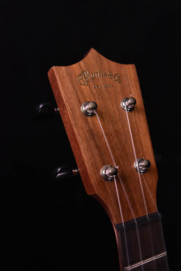 Koa ukulele headstock with Martin & Co logo and tuning pegs