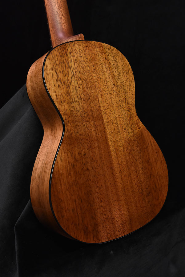 Koa ukulele back with black binding outline
