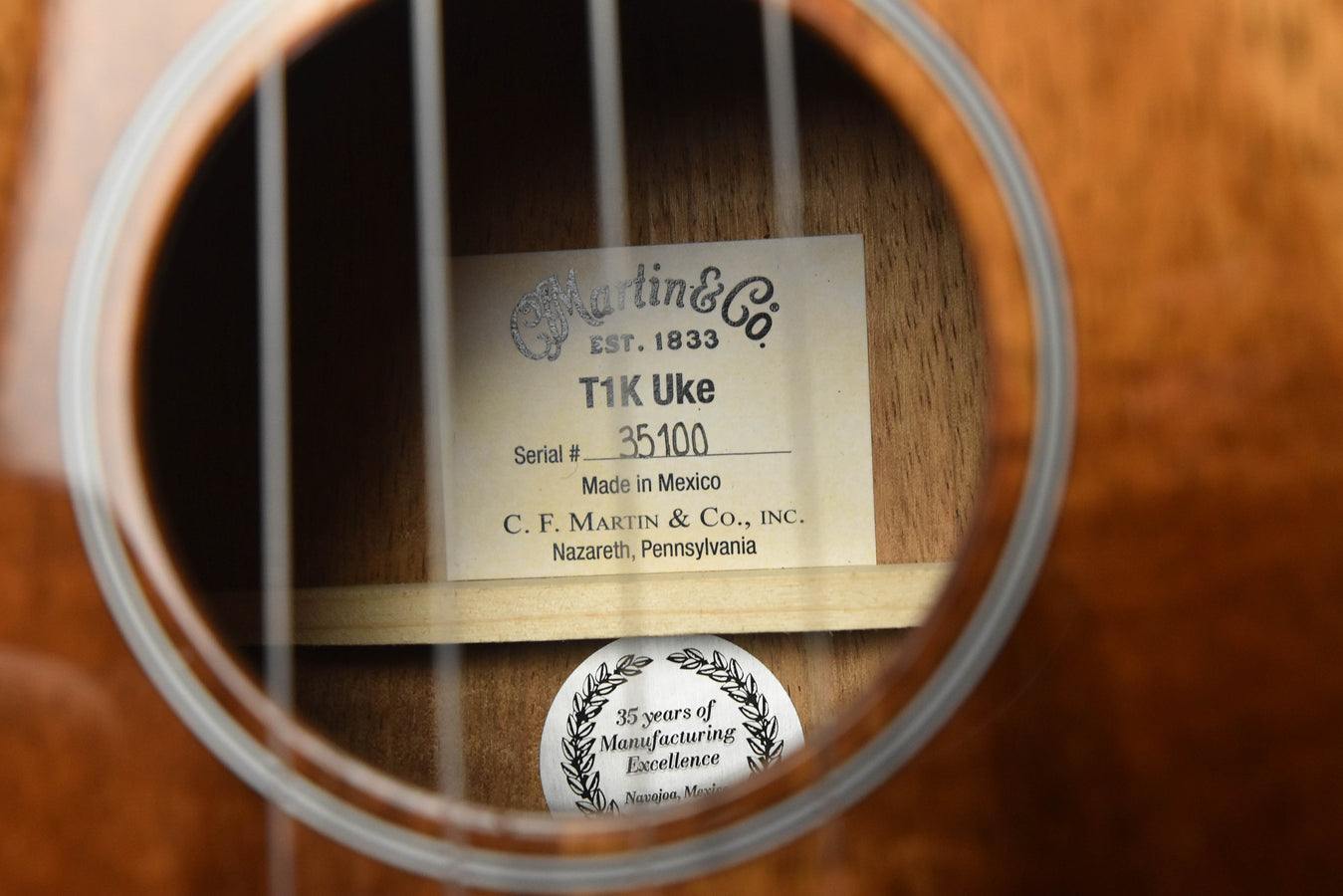 Martin & Co label inside the tenor ukulele on the soundboard