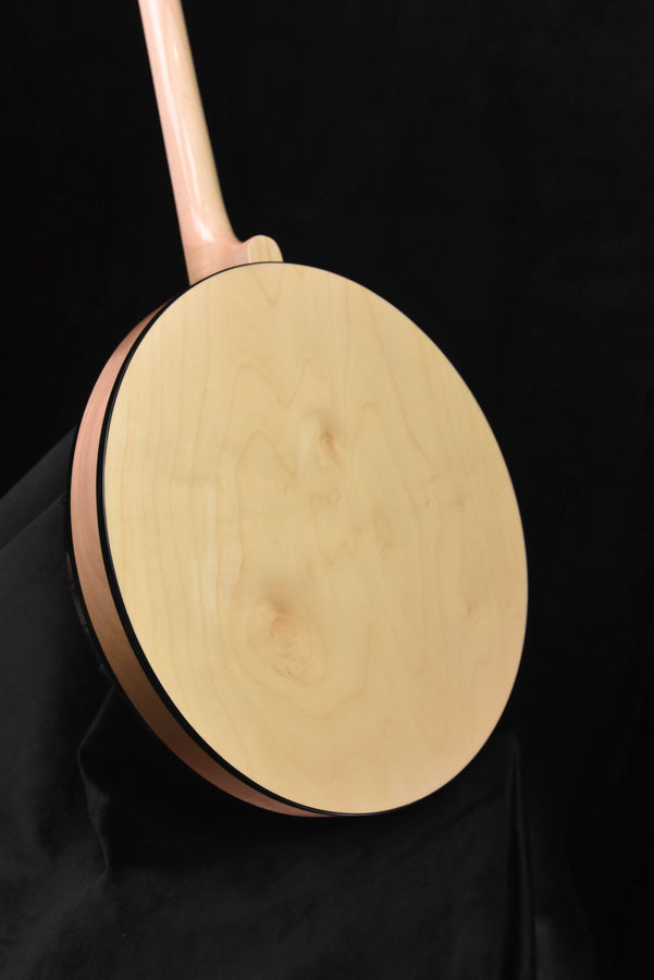 Irish tenor banjo back, natural light wood round body with dark rim trim