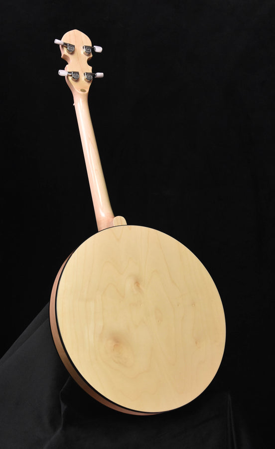 Irish tenor banjo showing headstock, natural wood round body and black edge trim