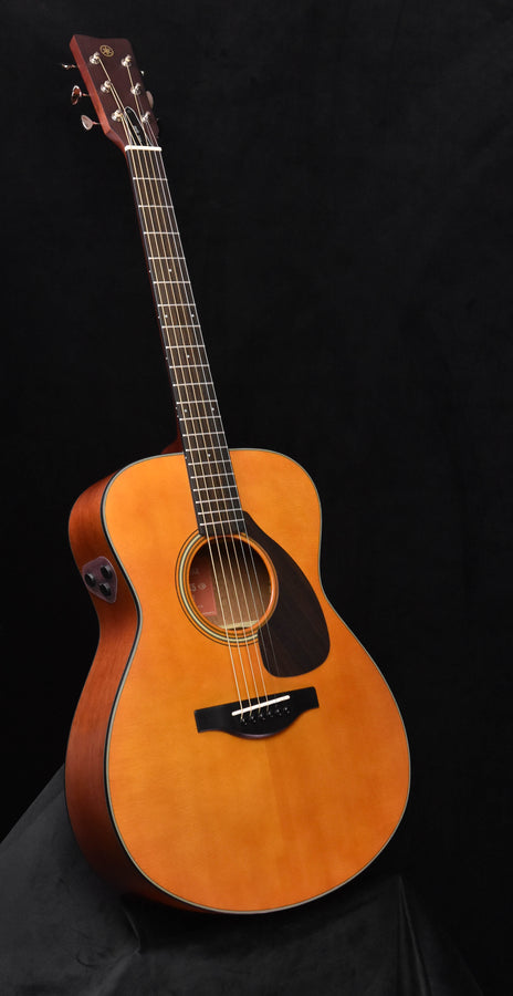 Yamaha FSX5 acoustic-electric guitar, natural orange-brown finish with black pickguard