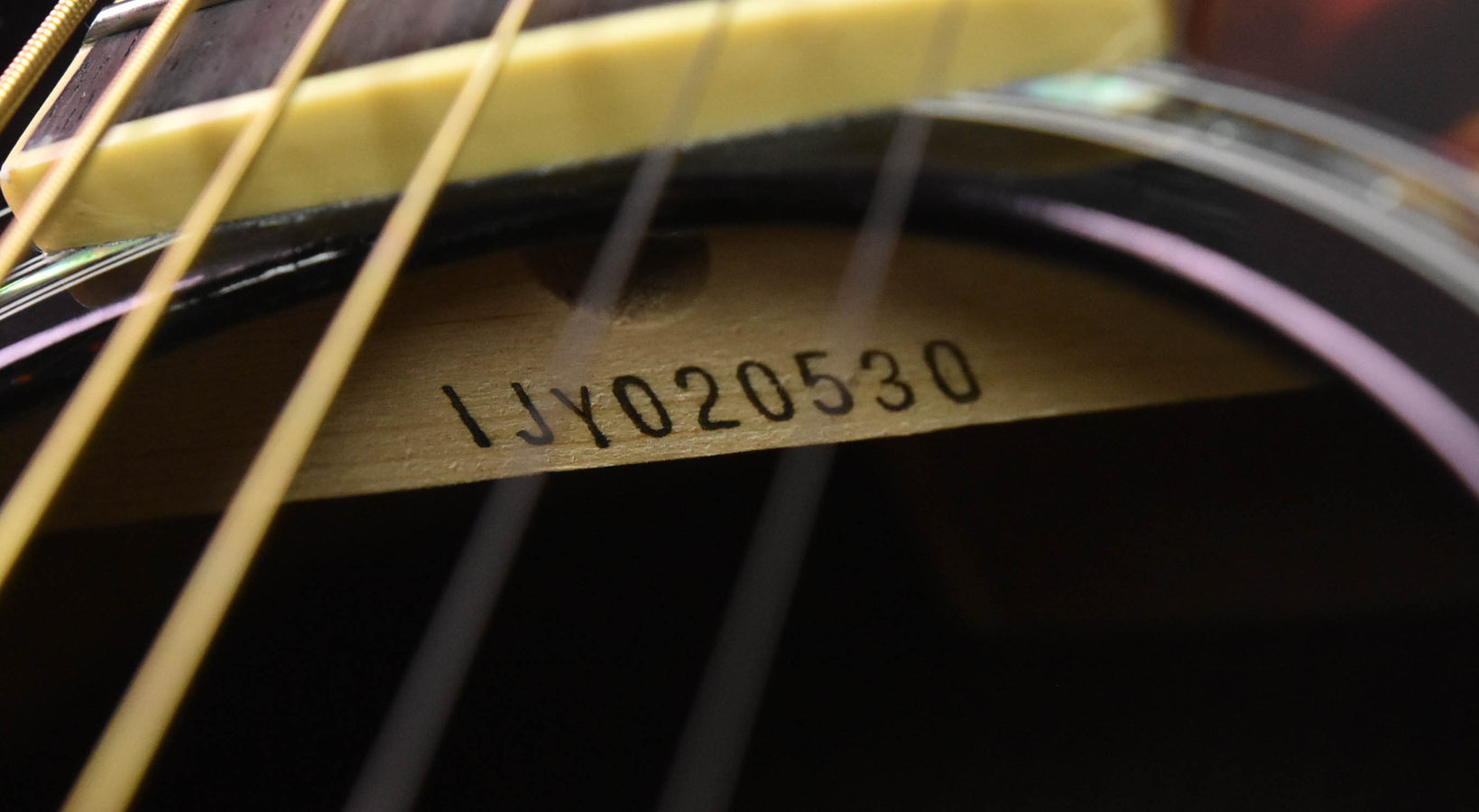 Acoustic guitar serial number on neck: 1JV020530