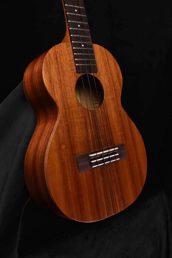 Tenor ukulele body with sound hole and bridge, natural brown wood top