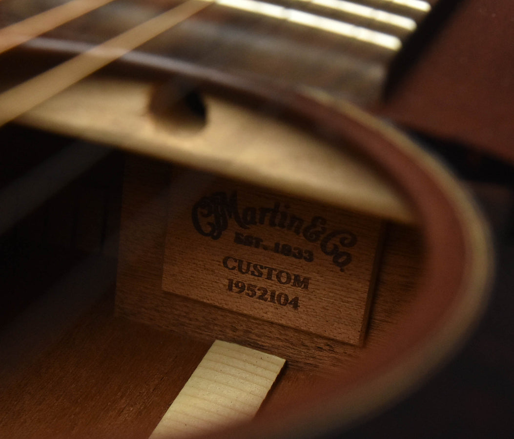Used acoustic guitar soundboard label: CUSTOM 1952104