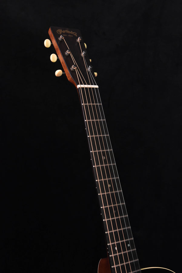 Martin CEO-7 headstock with tuning pegs and logo on dark wood