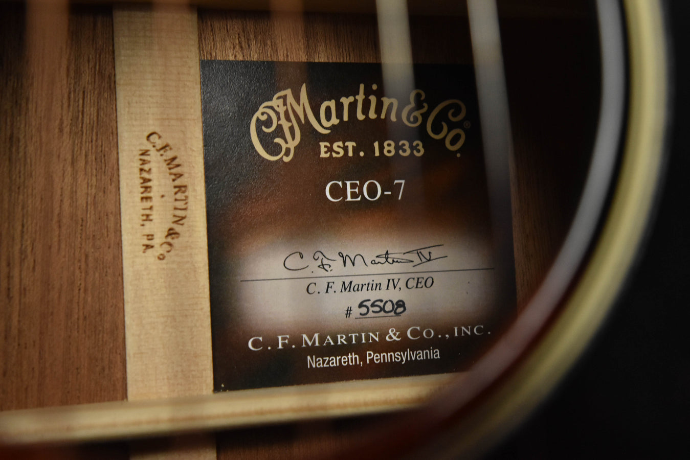 CEO-7 label on guitar interior with Martin & Co. est. 1833 text