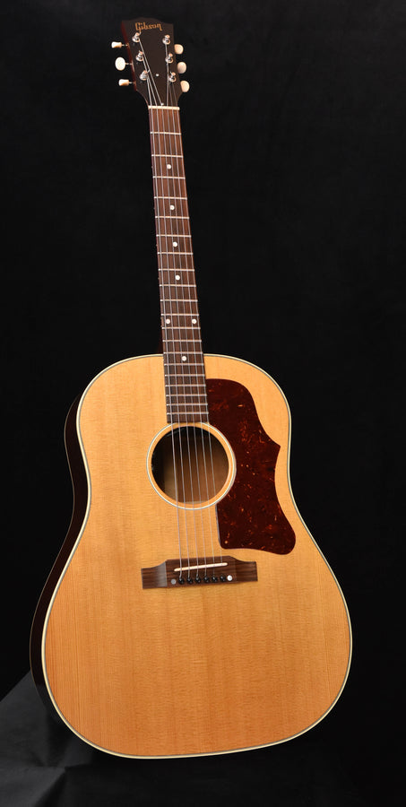 Used 1959 J-50 acoustic guitar, light wood body, dark pickguard and soundhole