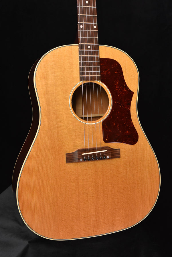 Used 1959 J-50 acoustic guitar, front view with pickguard, bridge and visible strings