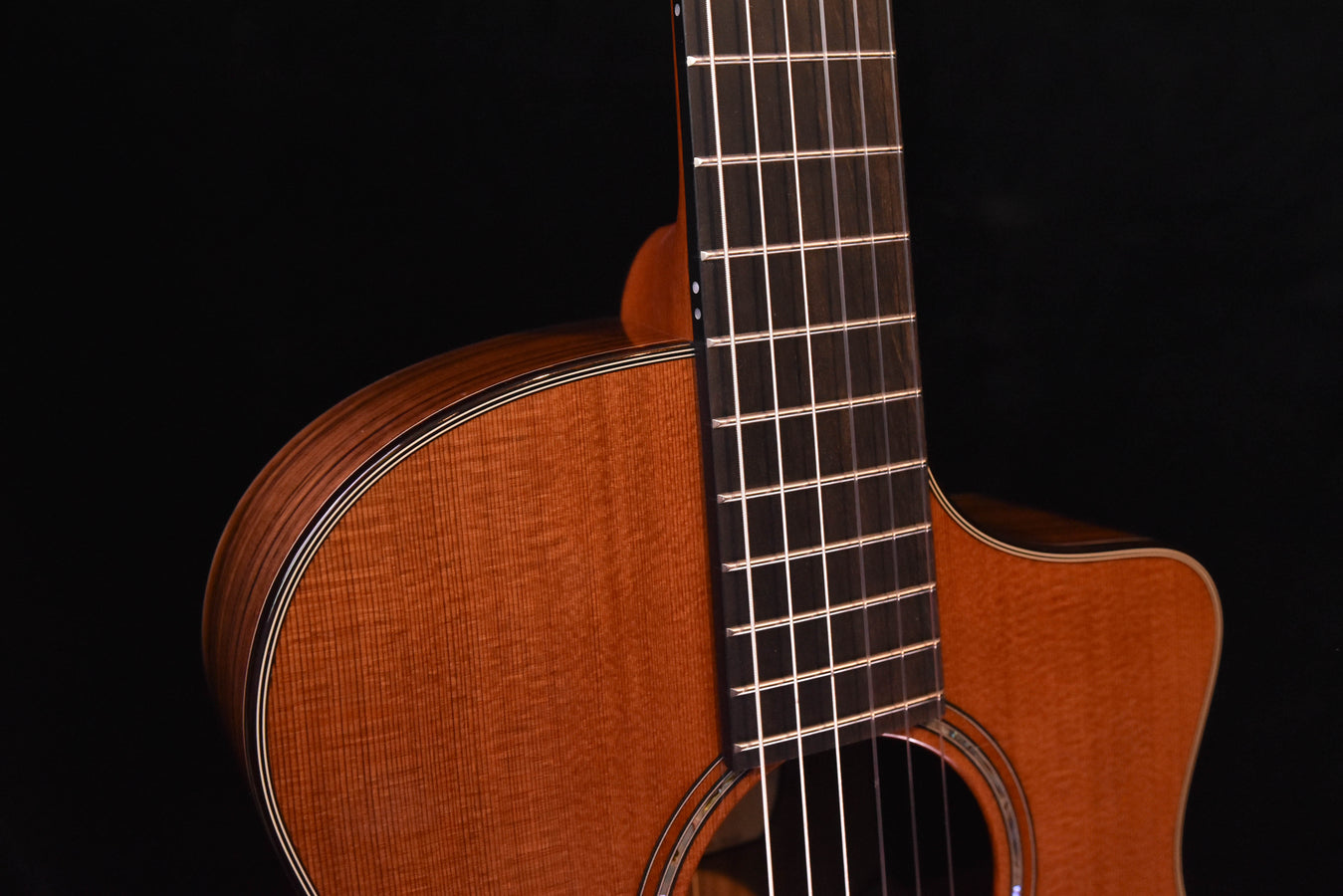 Crossover acoustic guitar neck and upper bout, natural wood grain