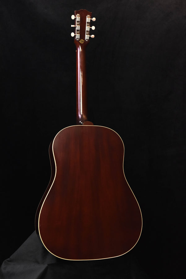 Used 1959 J-50 acoustic guitar, back view with dark glossy finish and binding