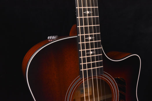 used 326e baritone guitar close-up of bridge, sound hole, and fretboard