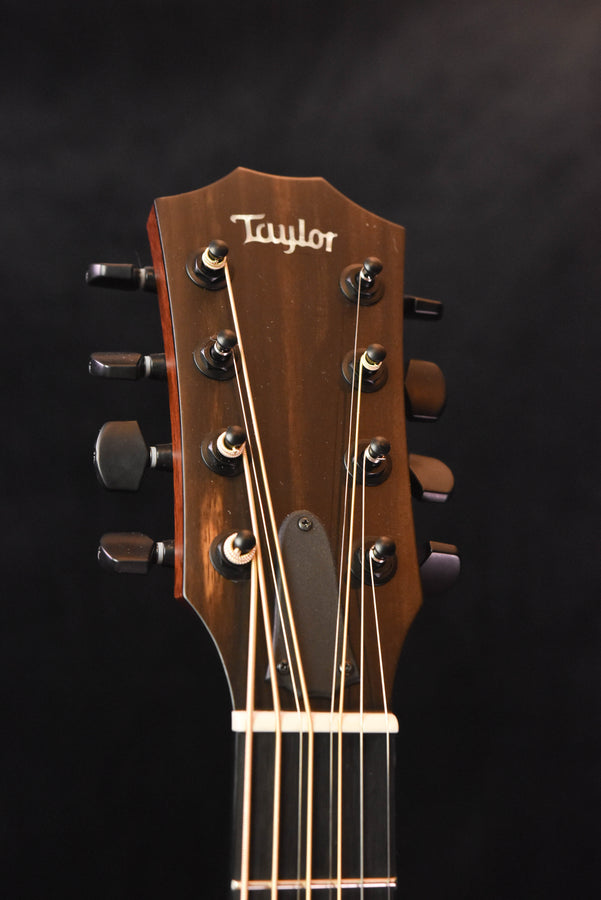 Used 326E baritone guitar headstock with Taylor logo and tuning pegs