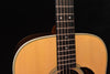 D-28E fretboard close-up with dot inlays and maple neck, upper body edge