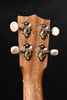All-koa concert ukulele headstock with four tuning machines and white buttons