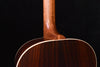 Acoustic guitar neck joint and upper back, close side view