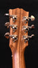 Acoustic guitar headstock with tuning pegs and stamped serial number