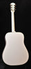 Alpine White acoustic guitar with full body shape and headstock