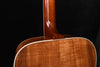 Acoustic guitar upper body and neck joint with glossy amber wood finish