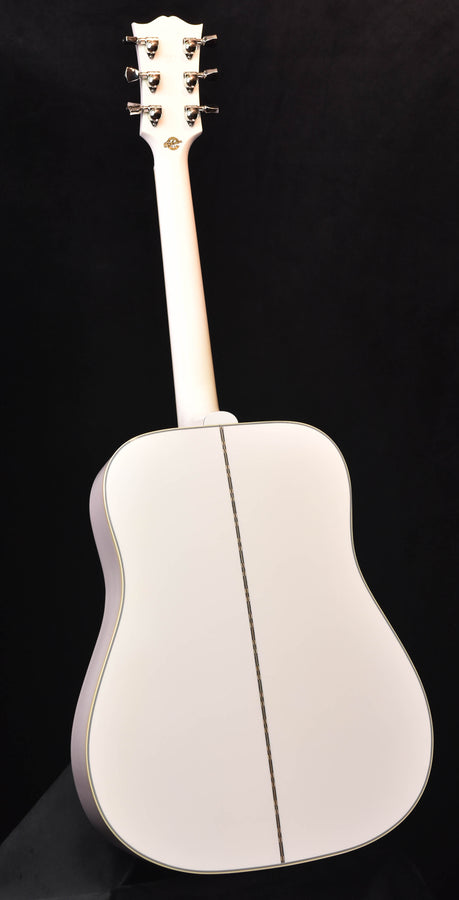 Alpine White glossy guitar back with central seam and thin dark edge binding