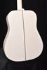 Alpine White glossy acoustic-electric guitar back with central seam and binding border