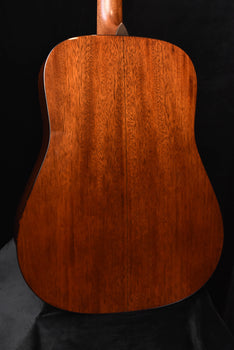 back of acoustic guitar with rich dark wood grain