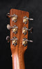 Acoustic guitar headstock with six tuning machines, metal buttons