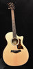 Taylor 314ce acoustic-electric guitar with natural body and circular sound hole