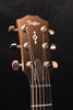 Guitar headstock with Taylor logo, chrome tuning pegs, and six-string nut
