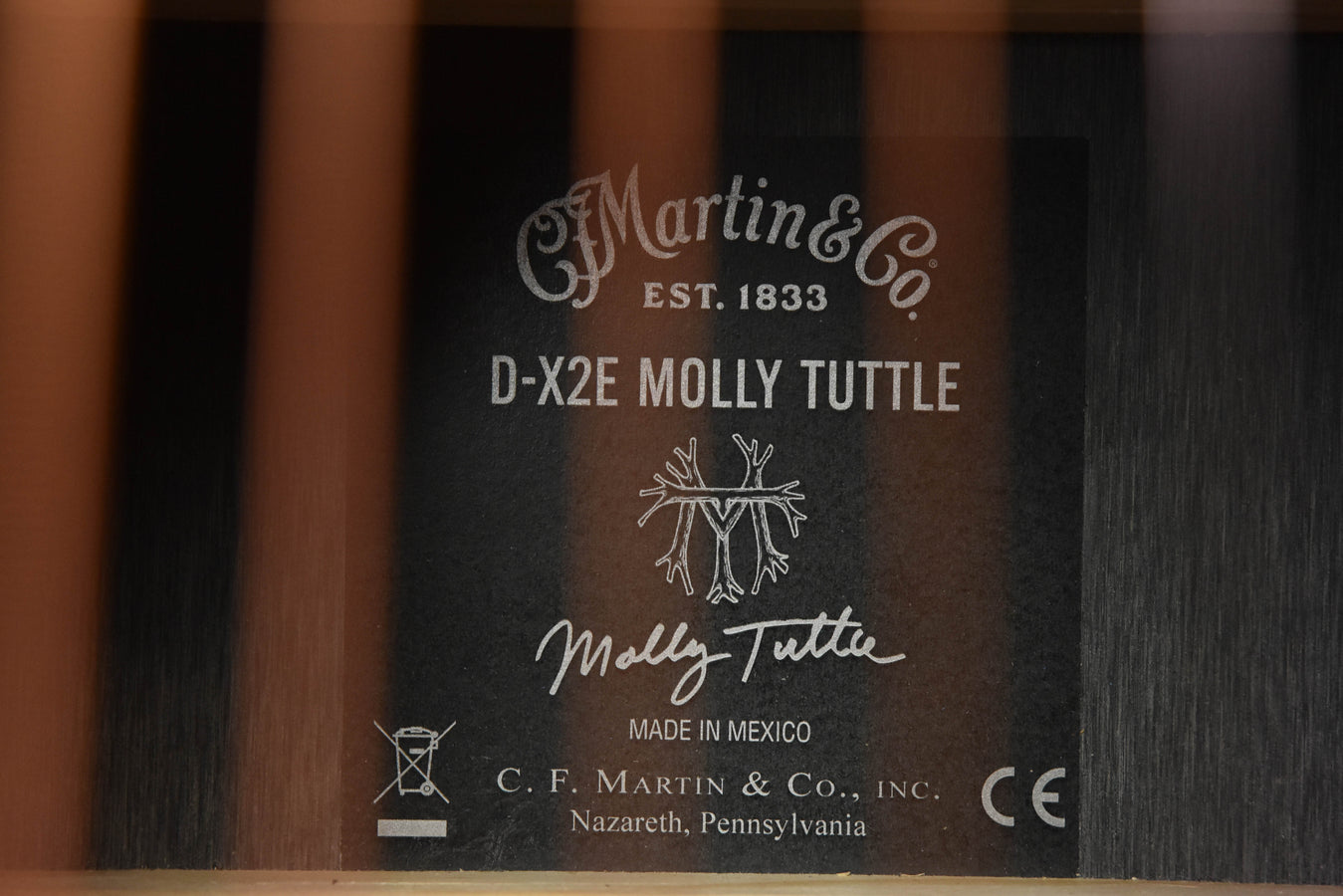 Martin D-X2E Molly Tuttle headstock back label with logo and 'Made in Mexico'