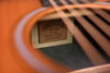 D-X2E Molly Tuttle headstock label with logo and serial number