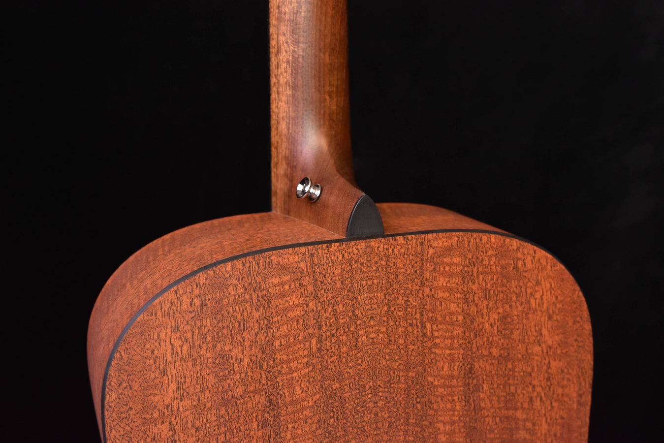 D-X2E Molly Tuttle guitar neck joint and upper bout, warm woodgrain finish