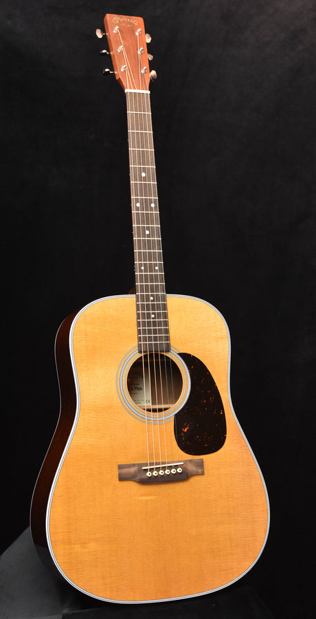 Martin DE Retro Plus acoustic guitar with light wood top and black pickguard