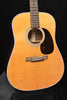 Retro Plus acoustic guitar close-up of round sound hole, bridge, and light wood body