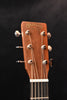 Martin acoustic guitar headstock with “Martin & Co.” logo and tuning pegs