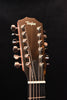 Taylor 12-string acoustic guitar headstock with tuning pegs, front close-up