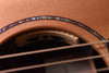 Used Lowden 32SE soundhole interior with bridge area and pickguard edge