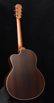 used lowden 32se guitar back view with dark wood finish and cream binding