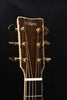 Yamaha acoustic guitar headstock with tuning pegs and Yamaha logo