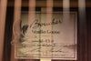 Studio Goose series headstock label with printed model and serial details