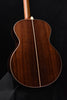 Yamaha jumbo acoustic guitar back view, curved sides and center seam detail