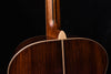Yamaha acoustic guitar neck joint over back, dark wood with binding