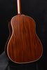 Acoustic guitar back with central seam and gold edge binding